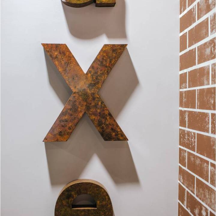 an axe sign on the wall